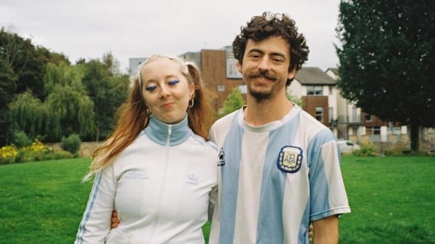 A couple posing for a photo
