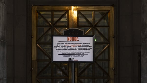 A closure notice is posted at the enterance of the Library of Congress