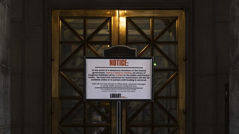 A closure notice is posted at the entrance of the Library of Congress in Washington DC