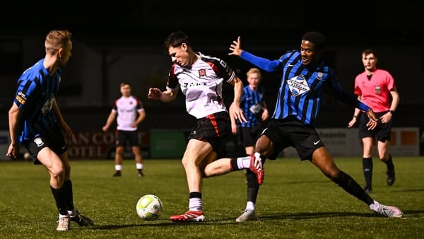Shane Tracey of Dundalk in action against Kelende Abdine Jr Thiam of Athlone Town during the SSE Airtricity Men's First Division match between Athlone Town and Dundalk at Athlone Town Stadium in Westmeath