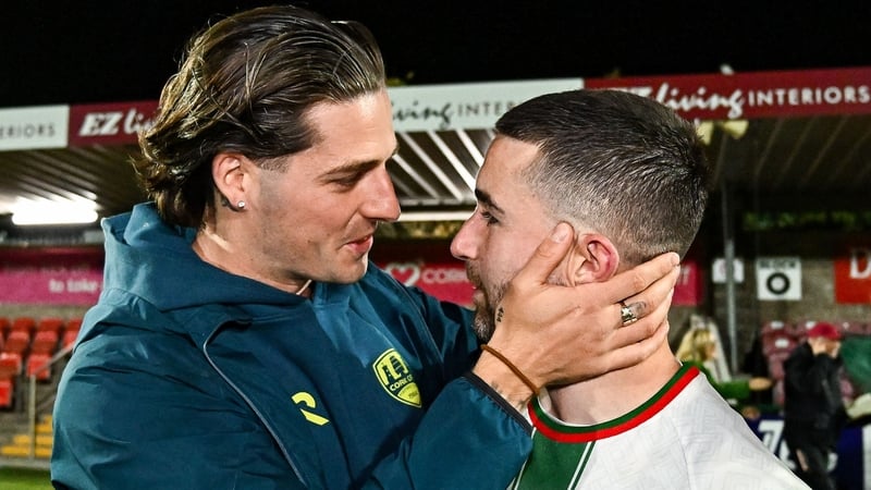 Seani Maguire embraced by Ruairí Keating after the semi-final win