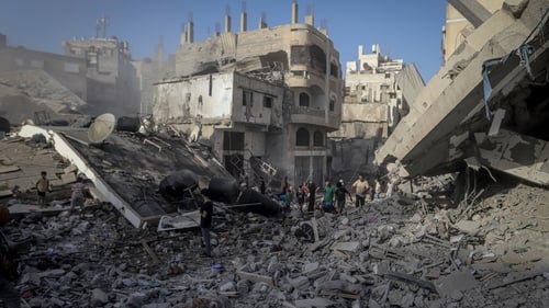 A view of destruction following an Israeli attack on Omar al-Mukhtar Street in Gaza City