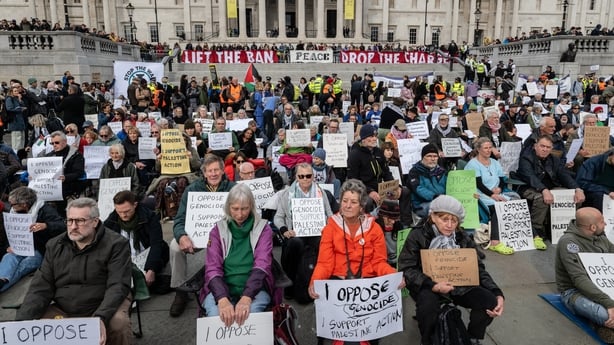 Activists defy the Palestine Action ban by holding illegal signs in Trafalgar Square London, England
