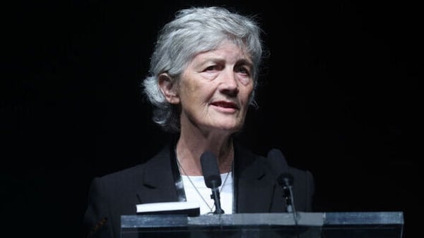 Presidential candidate Catherine Connolly speaking at a podium