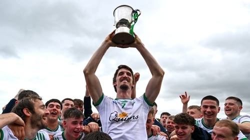 Baltinglass captain Pat Burke lifted the cup after the game