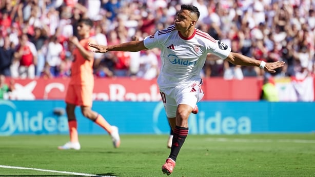 Alexis Sanchez of Sevilla FC celebrates his team's first goal scored from the penalty spot during the LaLiga EA Sports match between Sevilla FC and FC Barcelona at Estadio Ramon Sanchez Pizjuan on October 05, 2025 in Seville, Spain. 