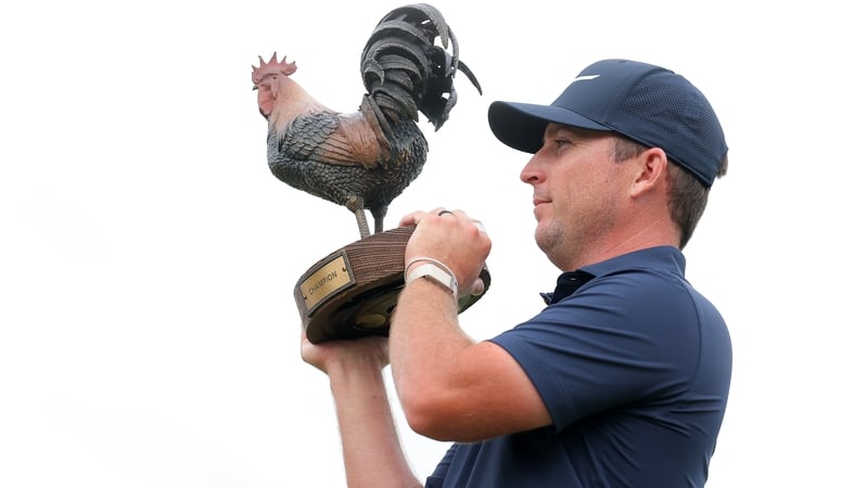 Steven Fisk poses with the trophy at the Country Club of Jackson