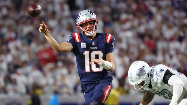 New England Patriots quarterback Drake Maye gets a pass away against the Buffalo Bills at Highmark Stadium