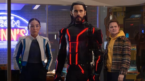 (L-R) Greta Lee as Eve Kim, Jared Leto as Ares, and Arturo Castro as Seth Flores in Tron: Ares Photo by Leah Gallo