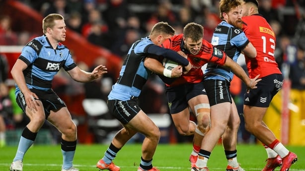 4 October 2025; Alex Nankivell of Munster is tackled by Callum Sheedy of Cardiff Rugby during the United Rugby Championship match between Munster and Cardiff Rugby at Thomond Park in Limerick. Photo by Brendan Moran/Sportsfile