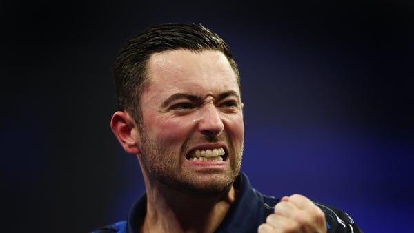 Luke Humphries of England celebrates victory in his first round match against Nathan Aspinall of England on day one of the Boyle Sports World Grand Prix at Mattioli Arena on October 06, 2025 in Leicester, England. (Photo by Dan Istitene/Getty Images)