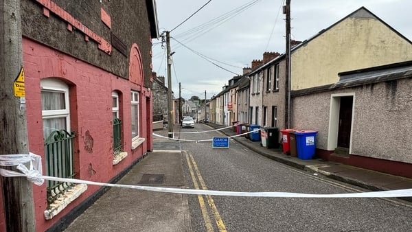 Garda crime scene tapes at a street in Cork city
