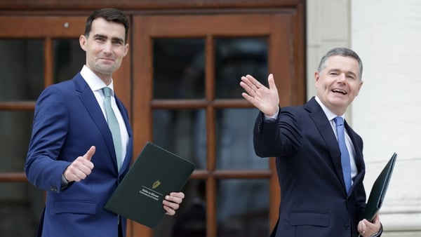 Ministers Chambers and Donohoe wave to media ahead of budget speeches