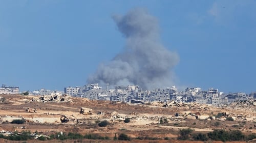 Smoke rises following an Israeli air strike in Gaza near Kibbutz Kfar Aza
