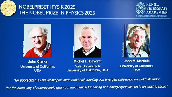 Photos of (LtoR) British physicist John Clarke at the University of California, USA, French physicist Michel H Devoret (University of California and Yale) and US physicist John M Martinis (University of California) are seen on a screen during a press conf