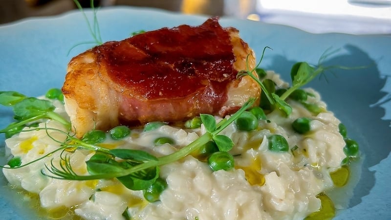 Neven's monkfish wrapped in Parma ham with pea and mint risotto
