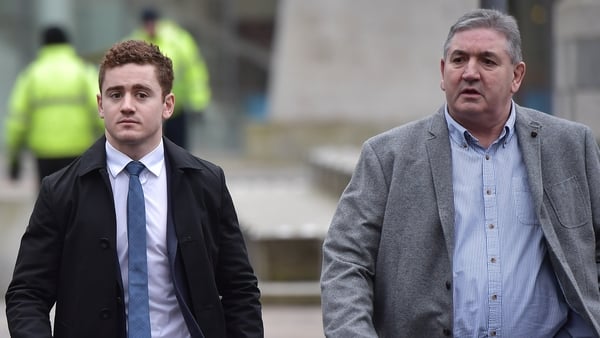 BELFAST, NORTHERN IRELAND - FEBRUARY 5: Paddy Jackson (C) arrives at Belfast Laganside courts alongside family members on February 5, 2018 in Belfast, Northern Ireland. The Ireland and Ulster rugby player is accused of raping a woman in June 2016 at a pro