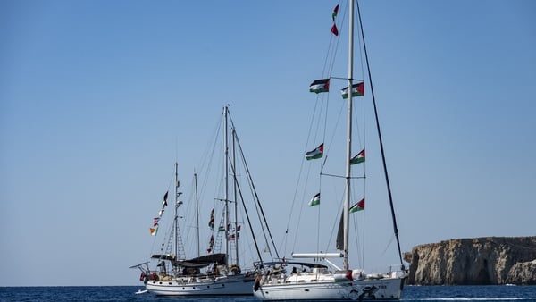Two sail boats anchored in the sea