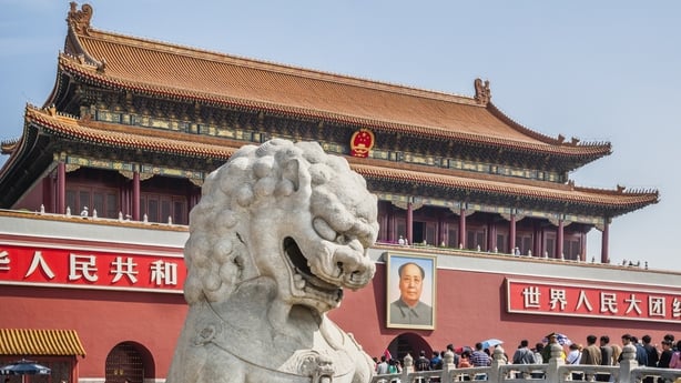 Statue of a lion guarding the bridges at the Gate of Heavenly Peace