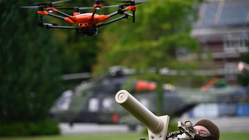 A soldier of the German armed forces Bundeswehr demonstrates the use of a handheld HP 47 drone jammer during exercises in Hamburg