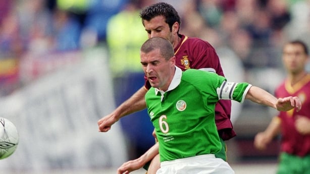 Roy Keane of Republic of Ireland holds the ball up against Luis Figo of Portugal during the FIFA World Cup 2002 Group Two Qualifying match played at Lansdowne Road, in Dublin, Ireland. The match ended in a 1-1 draw. \ Mandatory Credit: JamieMcDonald /Allsport
