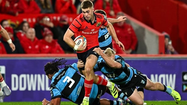 4 October 2025; Jack Crowley of Munster is tackled by Johan Mulder of Cardiff Rugby during the United Rugby Championship match between Munster and Cardiff Rugby at Thomond Park in Limerick. Photo by Sam Barnes/Sportsfile
