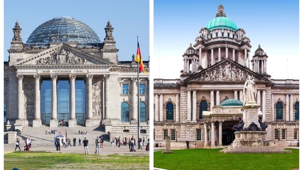 The Reichstag building in Germany pictured beside Belfast City Hall