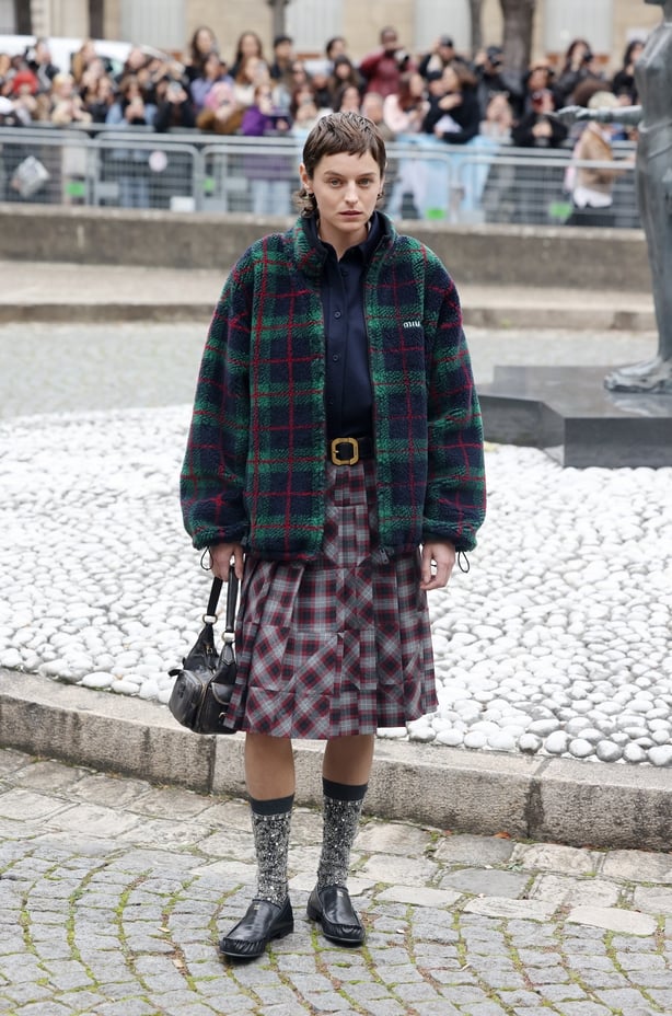 Emma Corrin attends Miu Miu fashion show