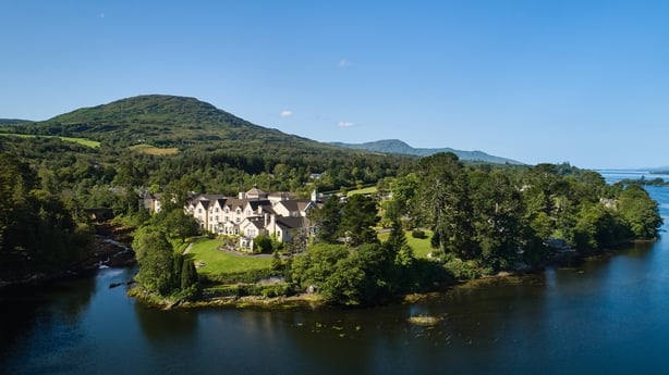 An aerial shot of Sheen Falls Lodge on a sunny day