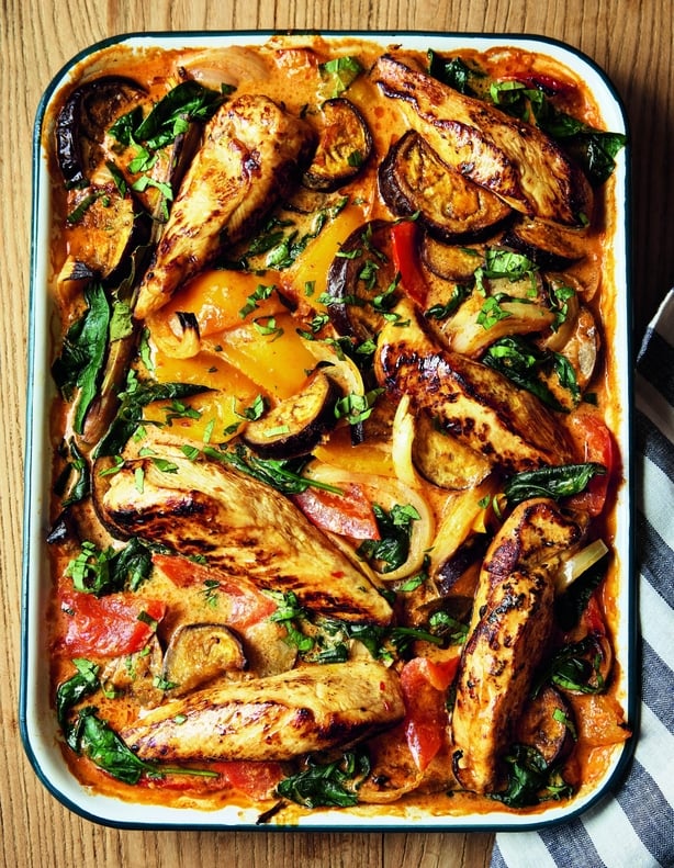 A chicken tray bake with colourful vegetables