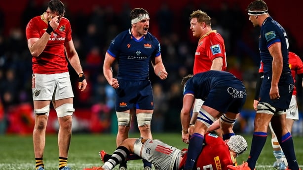 28 February 2025; Ben Muncaster of Edinburgh, centre, celebrates after a turnover in possession during the United Rugby Championship match between Munster and Edinburgh at Virgin Media Park in Cork. Photo by Tyler Miller/Sportsfile