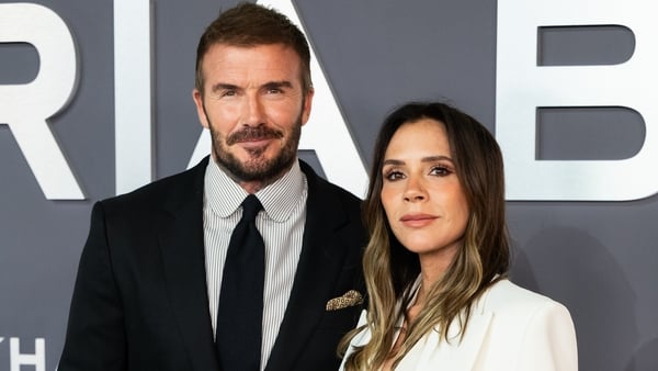 Former footballer and former Spice Girl pose on the red carpet