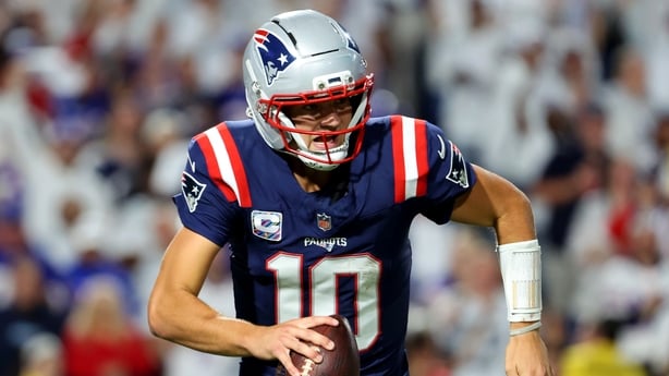 Drake Maye #10 of the New England Patriots runs the ball against the Buffalo Bills at Highmark Stadium on October 5, 2025 in Orchard Park, New York.