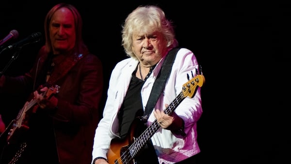 The Moody Blues guitarist John Lodge performing onstage