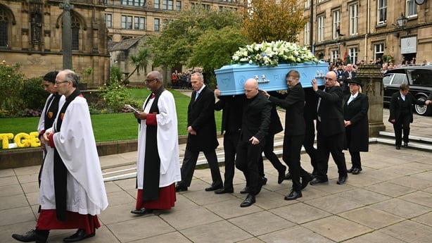 Pall-bearers carry the coffin into the Cathedral during the funeral of late British boxer Ricky Hatton at Manchester Cathedral, north-west England on October 10, 2025. Ricky Hatton's family said Monday they feel an "immeasurable" sense of loss after the death of the British former boxing world champ