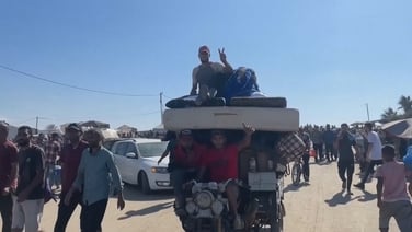 Displaced Palestinians in Gaza head north after ceasefire agreement