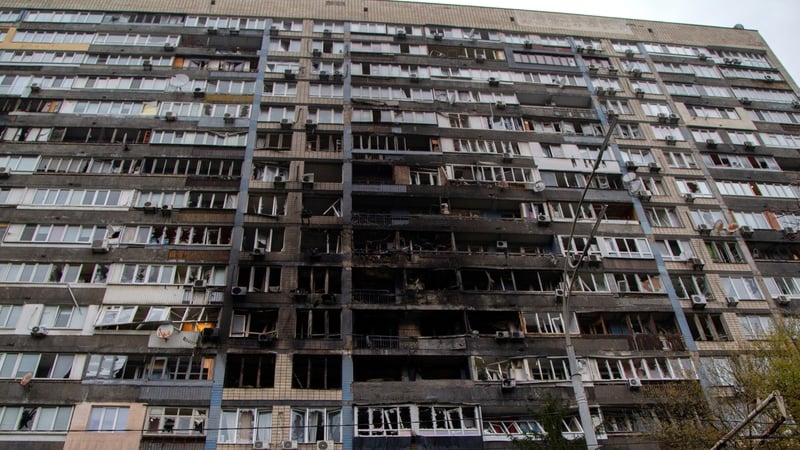 An apartment block catches fire due to falling Russian drone debris in the Pecherskyi district of Kyiv