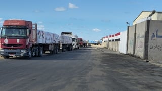 Trucks carrying humanitarian aid are preparing to depart from Egypt's Arish region toward the Rafah border crossing into Gaza