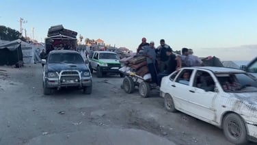 Palestinians return to north of Gaza as ceasefire appears to hold