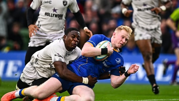 11 October 2025; Jamie Osborne of Leinster dives over to score his side's first try despite the efforts of Emmanuel Tshituka of Hollywoodbets Sharks during the United Rugby Championship match between Leinster and Hollywoodbets Sharks at the Aviva Stadium