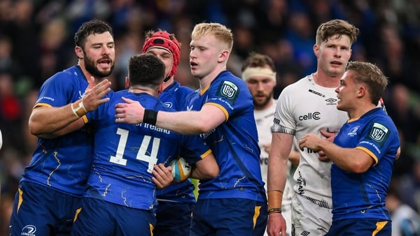 11 October 2025; Jimmy O'Brien of Leinster celebrates with teammates after scoring their side's second try despite the tackle of Makazole Mapimpi of Hollywoodbets Sharks during the United Rugby Championship match between Leinster and Hollywoodbets Sharks