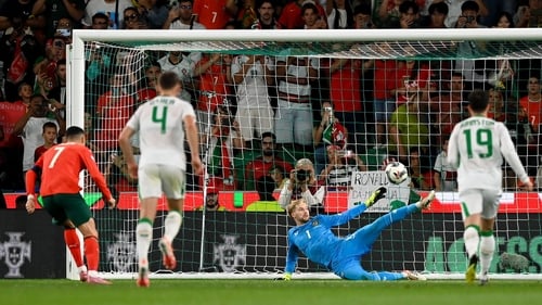 Caoimhín Kelleher saves Cristiano Ronaldo's penalty with an out-stretched leg