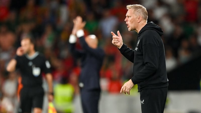 Heimir Hallgrimsson watching on during the game in Lisbon in October