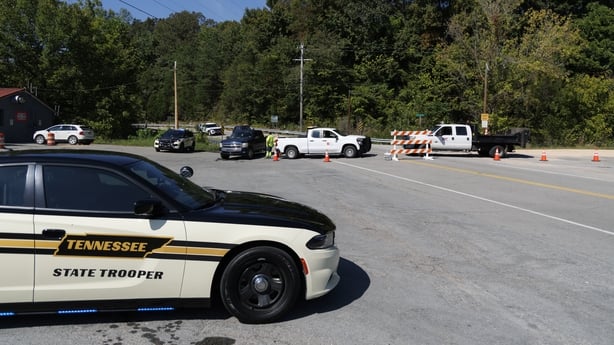 MCEWEN, TENNESSEE - OCTOBER 10: Police and department of transportation workers block the road leading to Accurate Energetic Systems on October 10, 2025 in McEwen, Tennessee. An explosion this morning at Accurate Energetic Systems left over a dozen people missing. (Photo by Brett Carlsen/Getty Image