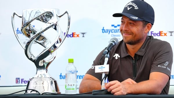 YOKOHAMA, JAPAN - OCTOBER 12: Xander Schauffele of the United States attends a press conference after winning the tournament following the final round of the Baycurrent Classic Presented by LEXUS at Yokohama Country Club on October 12, 2025 in Yokohama, K