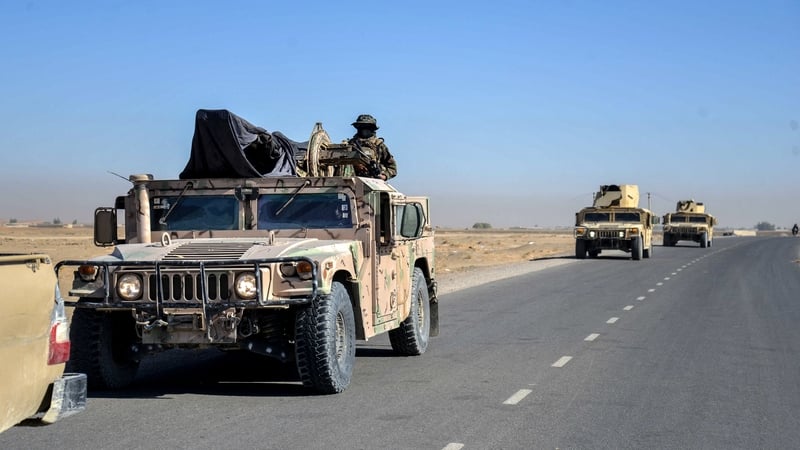 Taliban security personnel patrol in a convoy at the Mazal area of the Shorabak district near the Afghanistan-Pakistan border