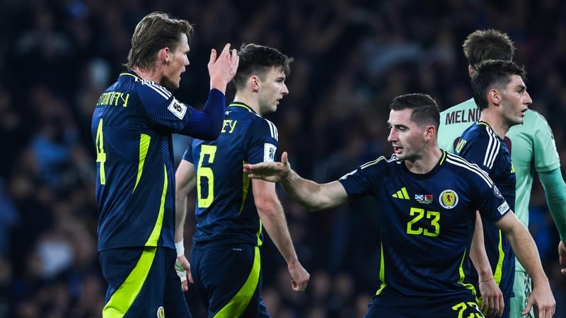 Scotland's Scott McTominay celebrates with Kenny McLean after his goal