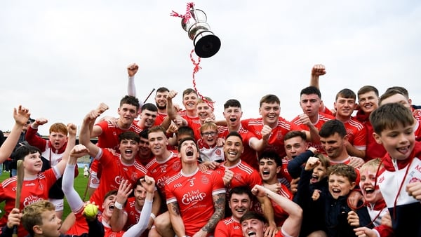 12 October 2025; Éire Óg captain Aaron Fitzgerald celebrates with his teammates and the Jack Daly cup after winning the Clare County Senior Club Football Championship final match between Éire Óg Ennis and St Joseph’s Doora-Barefield at Zimmer Biomet Páirc