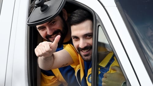 Twin brothers Ziv and Gali Berman wave to supporters after their release from Gaza