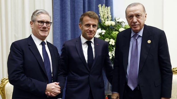(From L) Britain's Prime Minister Keir Starmer, France's President Emmanuel Macron and Turkey's President Recep Tayyip Erdogan pose as they attend a meeting on the sideline of Sharm El-Sheikh Peace Summit, in the Egyptian Red Sea resort town of Sharm el-Sheikh, on October 13, 2025. The summit, co-ch